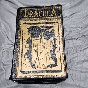 Dracula leather book purse. NWOT.  Shoulder strap.